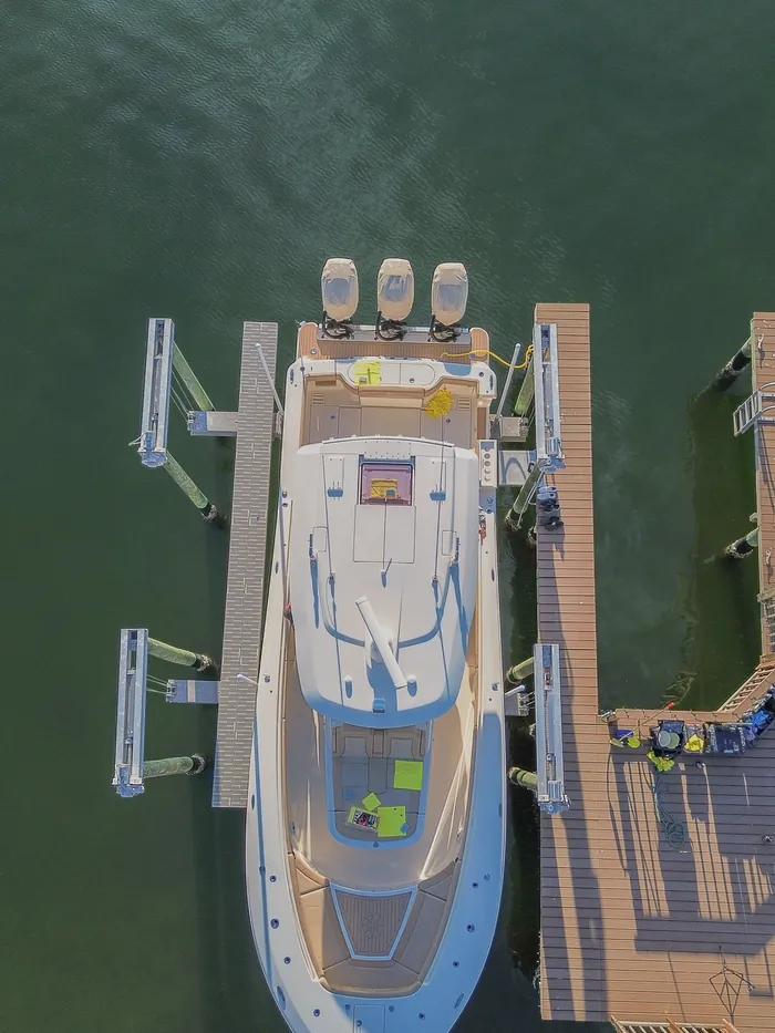 Aerial of a center console boat on a dock lift