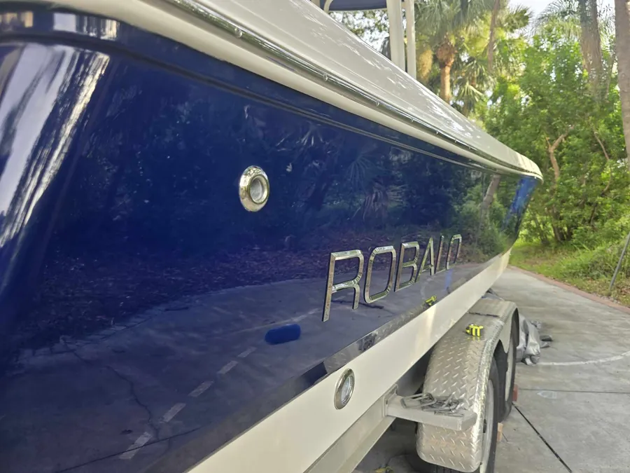 Deep gloss restored to a boat hull after oxidation removal